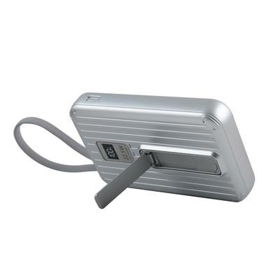 Bàn điện cầm tay màu trắng với hộp hướng dẫn cáp phụ kiện và 38.3 vượt qua